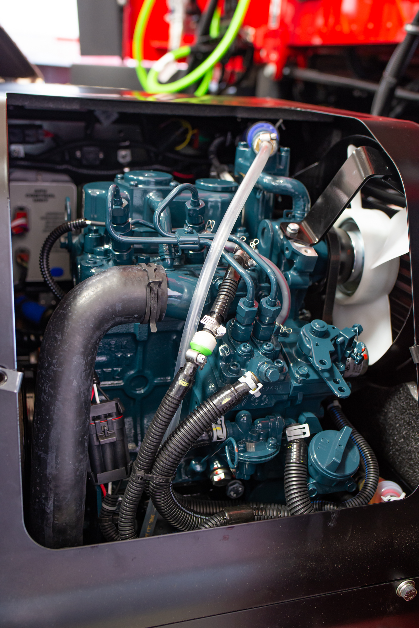 Carrier ComfortPro APU engine on a red truck at Crosspoint Power and Refrigeration