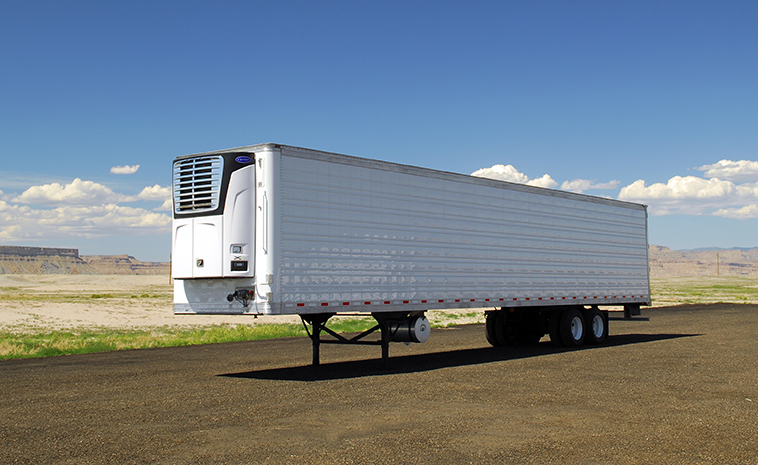 A refrigerated trailer in a desert