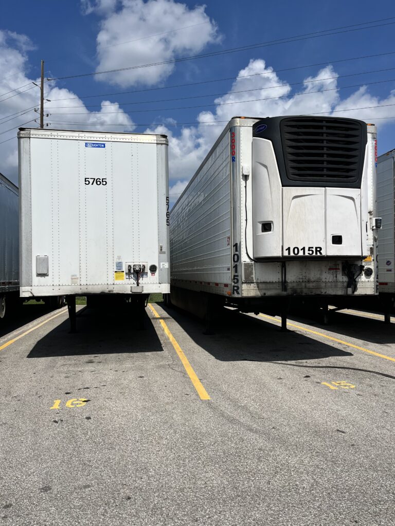 Reefer and Dry Van next to each other